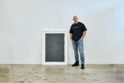 Large graphite abstract artwork exploring tonal depth by Daniel McMahon